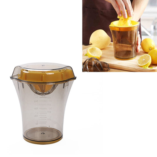 Manual fruit juicer with amber container and yellow citrus cone