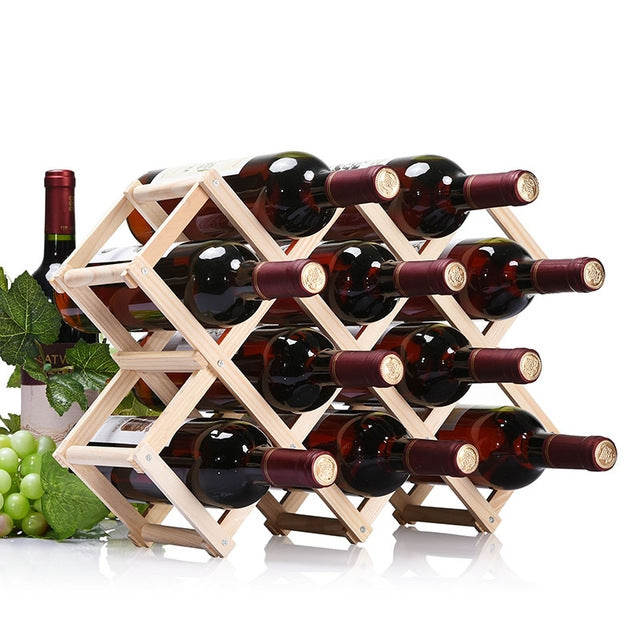 Light wood foldable wine rack holding wine bottles in diagonal crisscross rows