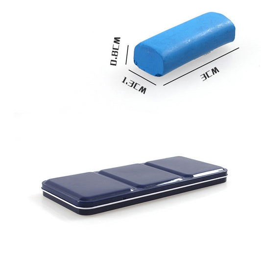 Portable watercolor paint case with dark blue cover and blue solid paint bar