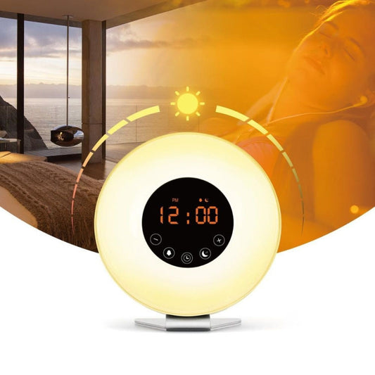 Round wake-up light alarm clock with yellow glow and digital time display