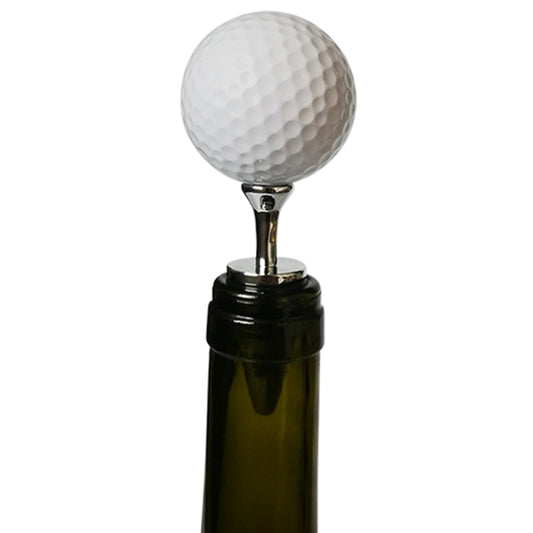 Golf ball bottle stopper with metallic tee, mounted on a dark glass wine bottle