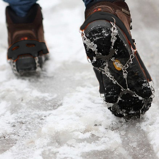Black ice gripper shoe cover with metal chains and 8-tooth spikes on boot