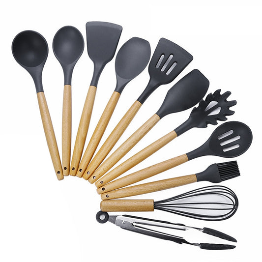 11-piece silicone cooking utensil set with black heads and light wood handles