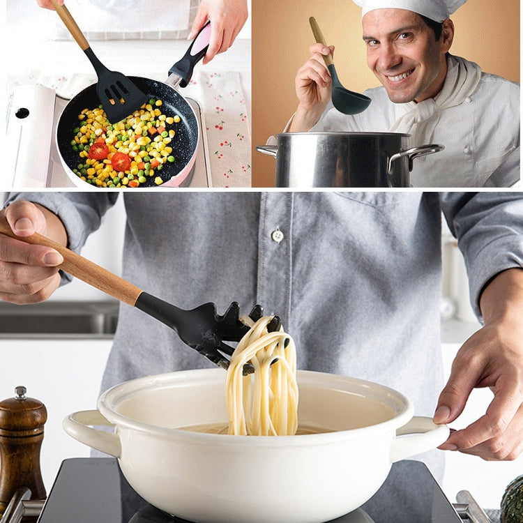 Chef using silicone spaghetti utensil with wooden handle over boiling pot