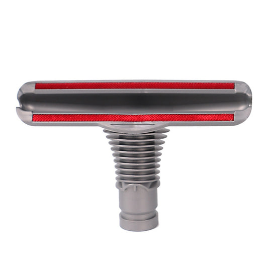 Gray sofa and mattress vacuum brush head with red bristle strip, round nozzle