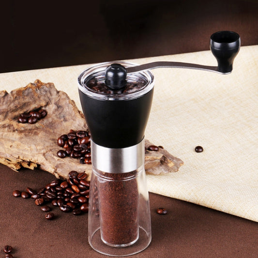 Manual conical burr coffee grinder with black top and clear grinding chamber