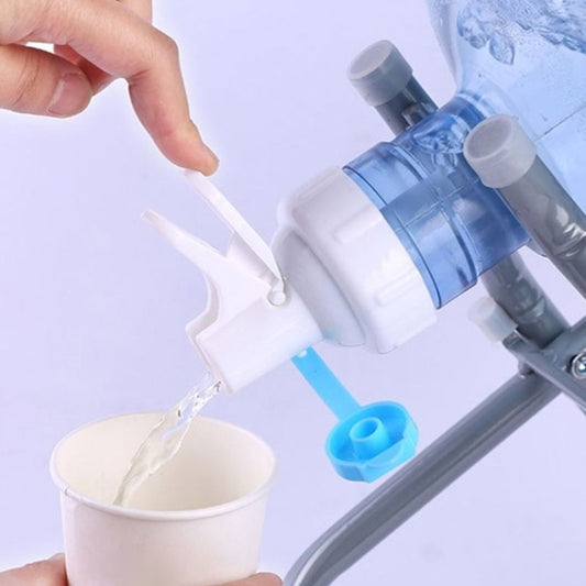 Water bottle faucet dispenser valve dispensing from a 55mm crown-top bottle into a cup