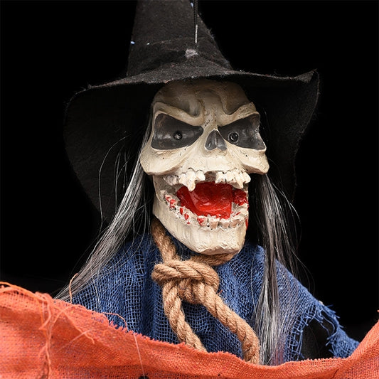 Skull-faced witch ghost with glowing red eyes, blue outfit, and orange shredded robe