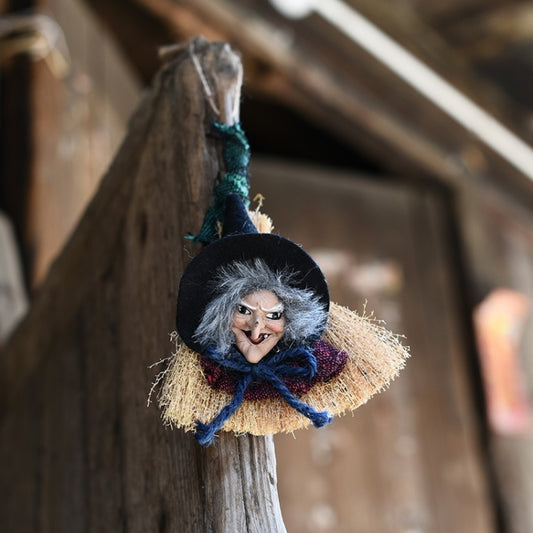 Witch broom hanging ornament with gray-haired doll and woven straw broom