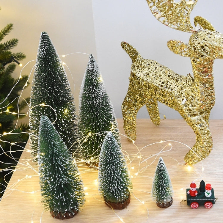 Artificial tabletop Christmas tree decorations, dark green flocked set with warm lights.