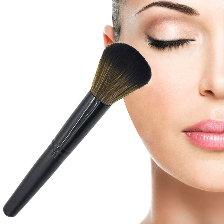 Makeup powder brush with black handle and soft dense bristles