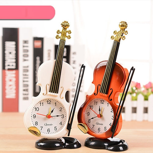 Pair of violin-shaped alarm clocks with pen holders: white and orange-red with black bases