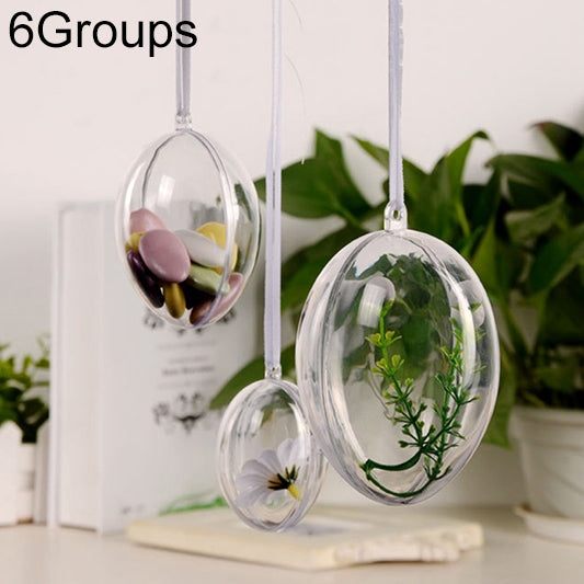 Clear plastic hollow oval hanging ornament with pastel flower inside and loop string