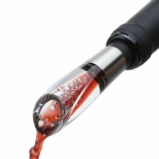 Wine pourer pouring red wine from clear aerating spout