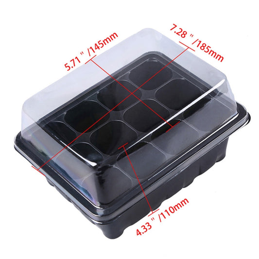 Small black seedling tray with 12 planting cells under a clear plastic lid