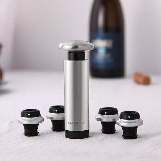 Stainless steel wine stopper pump with four black-and-silver vacuum stoppers