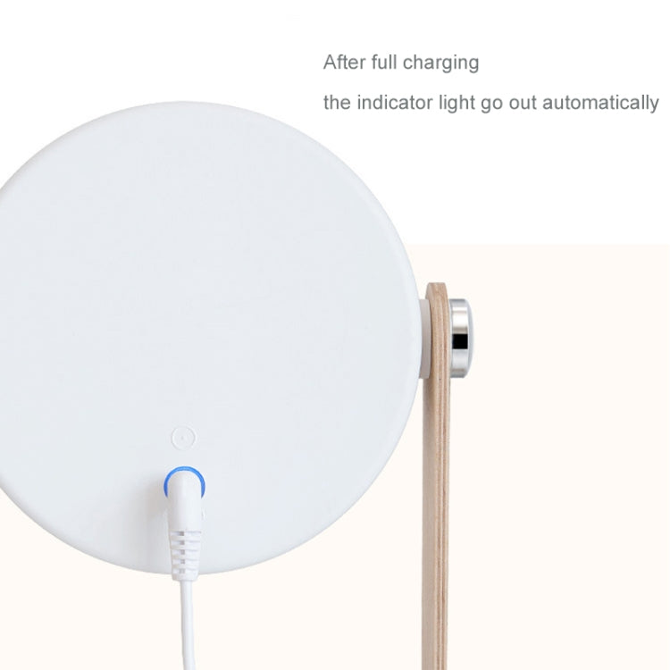 White lantern lamp back with charging cable plugged in and blue indicator light