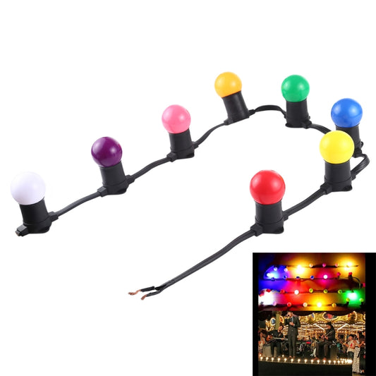 Multicolor LED string light with black wire, 8 globe caps, includes glowing inset
