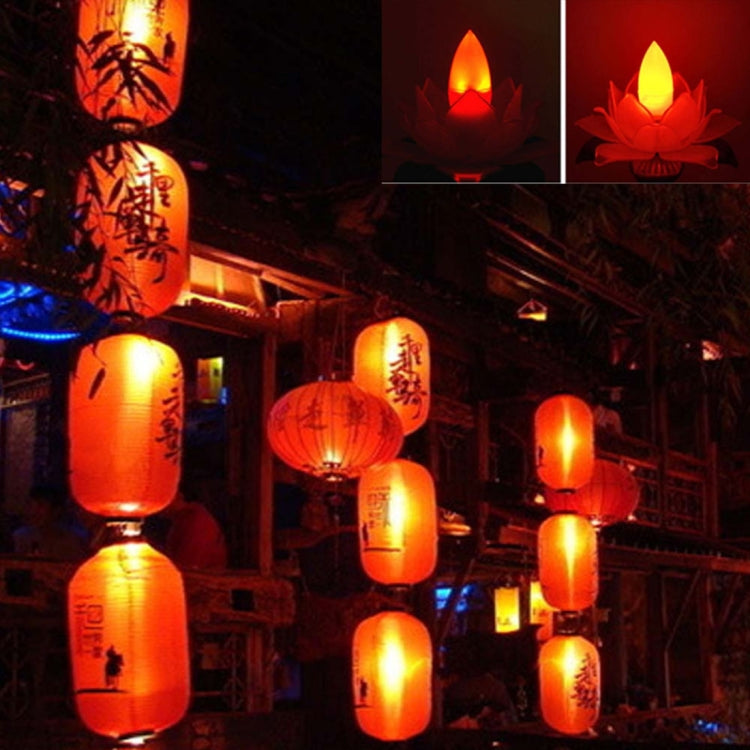 Red LED light bulbs glowing warm light in a hanging lantern display