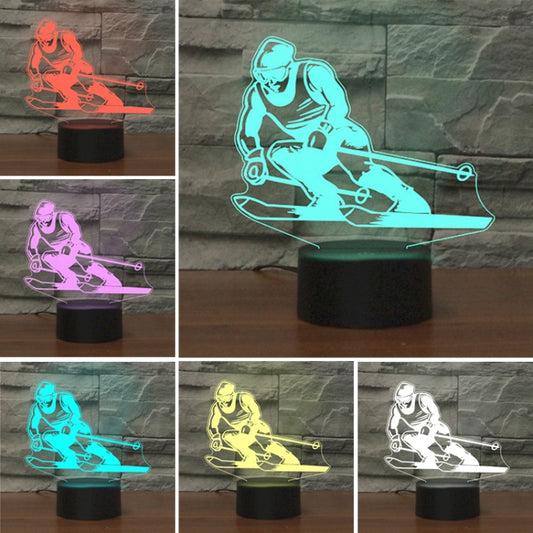 Color-changing skiing silhouette LED table lamp in multicolor light, black base