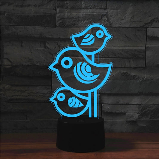 Blue three-bird LED table lamp with black base and light pillars