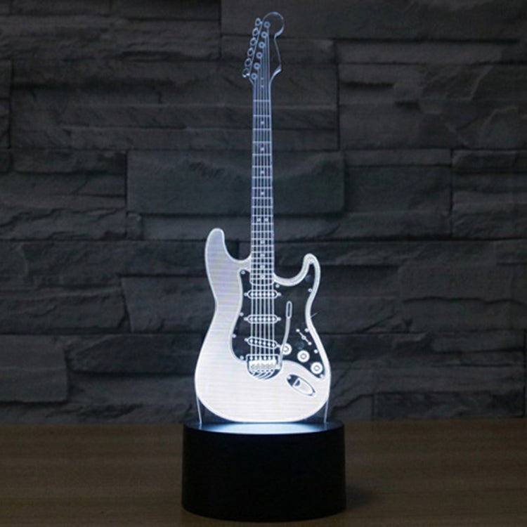 Electric guitar-shaped 7-color LED desk lamp with cool white blue light glow