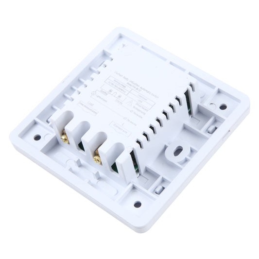 White sensor switch base with exposed wiring terminals and internal module