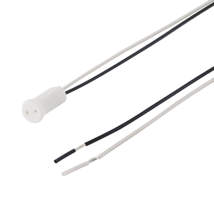 G4 LED bulb socket holder cable, close-up of white connector and two insulated wires