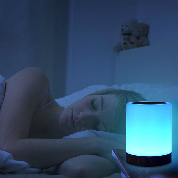 Blue glowing wood-grain touch night light for bedside atmosphere