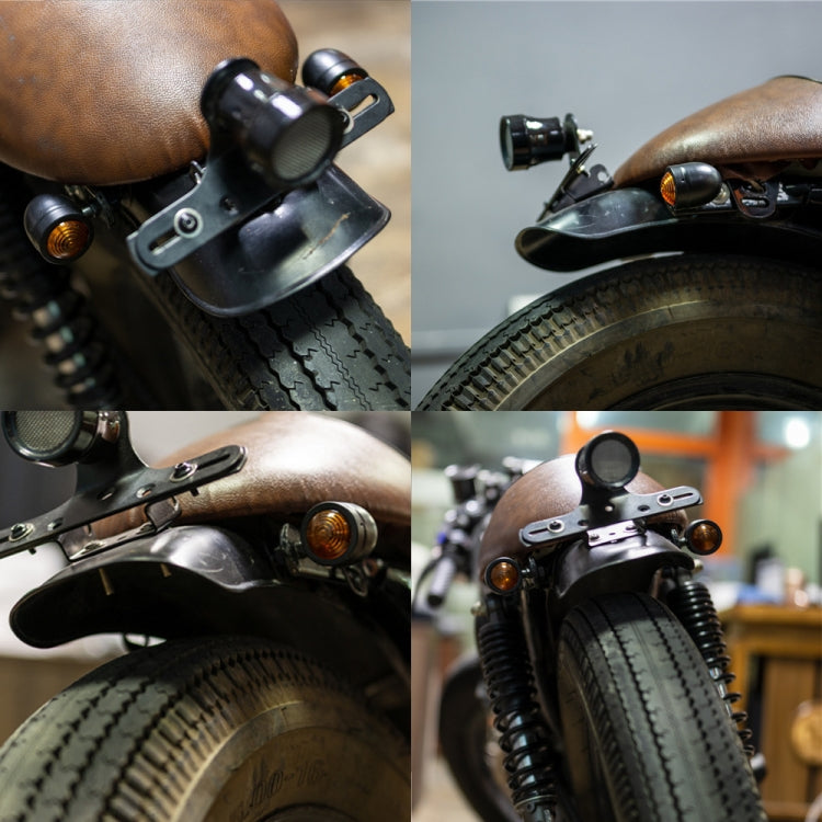 Mounted motorcycle LED turn signal pair on handlebars with amber lenses