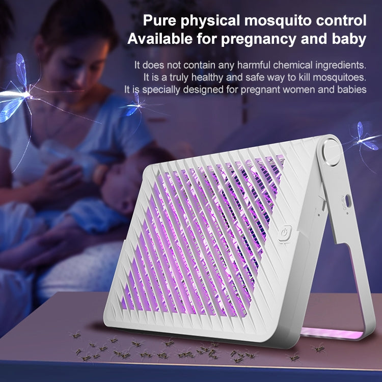 White foldable mosquito killer lamp on tabletop with glowing purple light grid