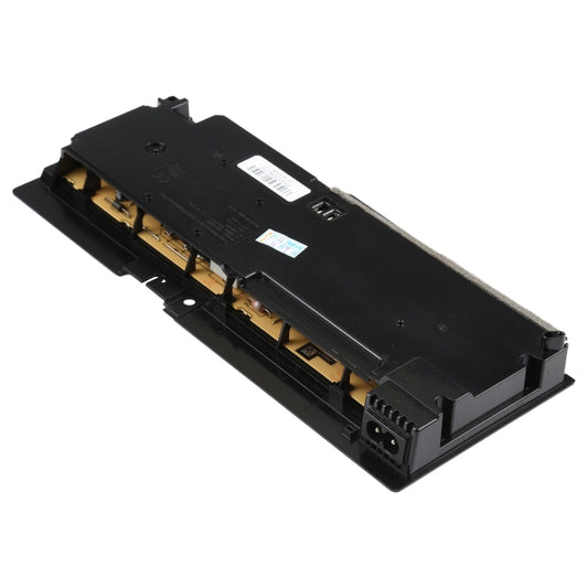 Power adapter module circuit side, black housing with gold contacts and label
