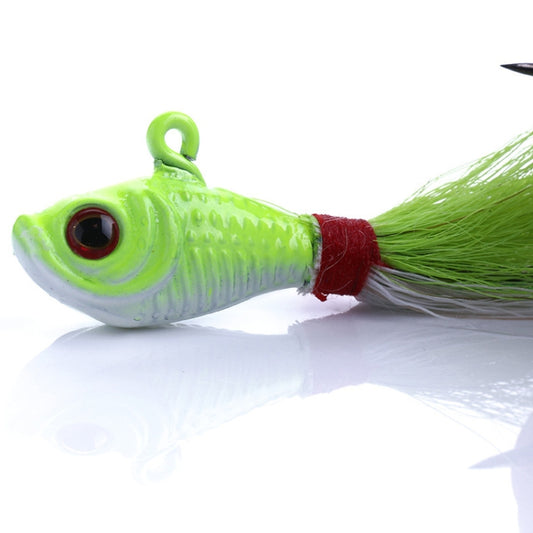 Green artificial fishing lure with green feather tail and red tie, treble hook