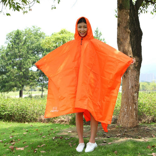 Orange hooded rain poncho, loose cape style with front closure for outdoor use