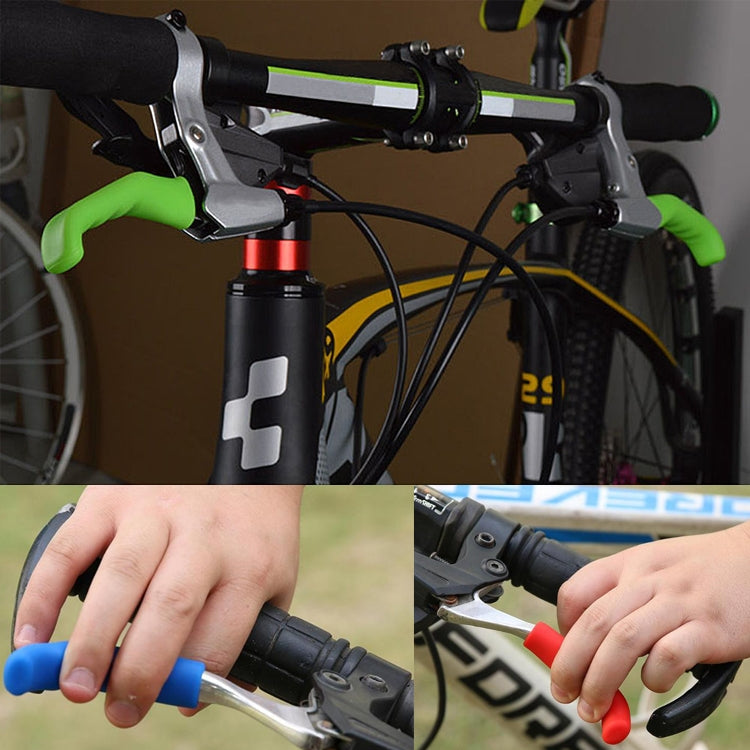 Black silicone brake covers installed on bike brake levers, hand fitting