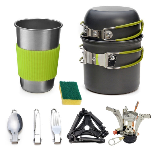 Portable camping cookware set with black pots, stainless cup, and green silicone sleeves