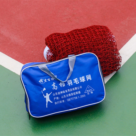 Portable badminton net, red roll in blue carrying bag