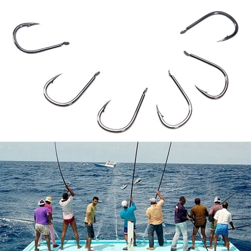 Assorted barbed fishing hooks arranged with curved points