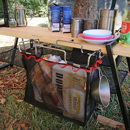 Foldable black mesh cookware organizer with silver metal frame and red handles