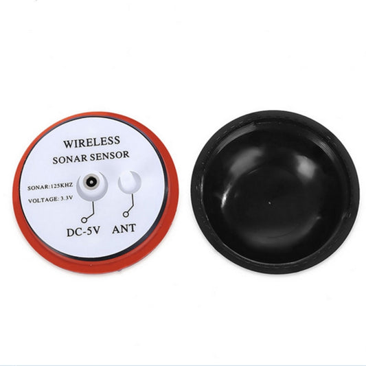 Wireless sonar sensor disk with wiring ports, red ring label, and black round cap