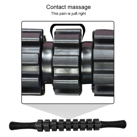Black segmented roller massage stick detail showing rotating contact rollers