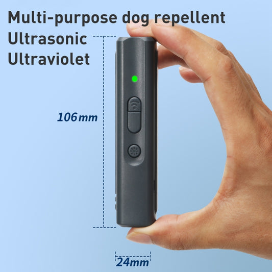 Black N11 dog repeller device held in hand, with side buttons and green status light