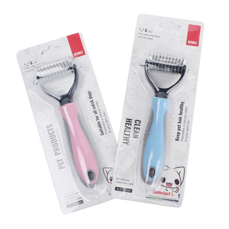 Two boxed dog grooming combs: blue and pink handles with stainless steel teeth