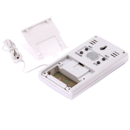 Digital hygrothermograph DT-5 open case showing battery compartment and contacts
