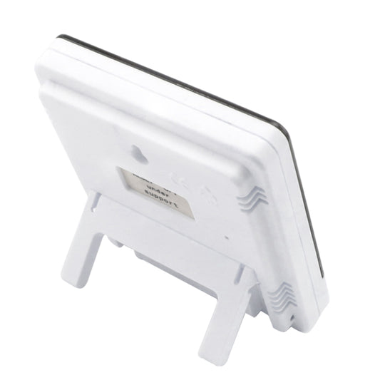 Digital temperature and humidity meter rear view with stand and battery compartment cover
