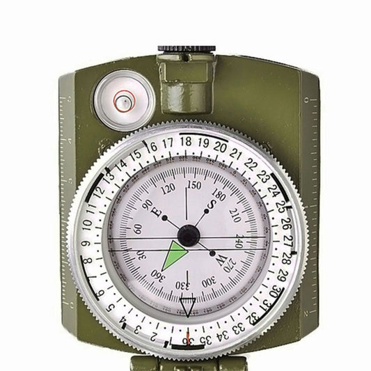 Army green pocket compass close-up of circular compass face with marked bezel