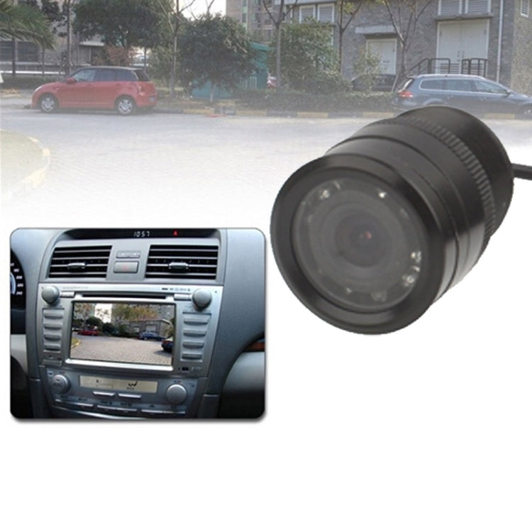 Rear view camera mounted view showing lens close-up and in-car display inset