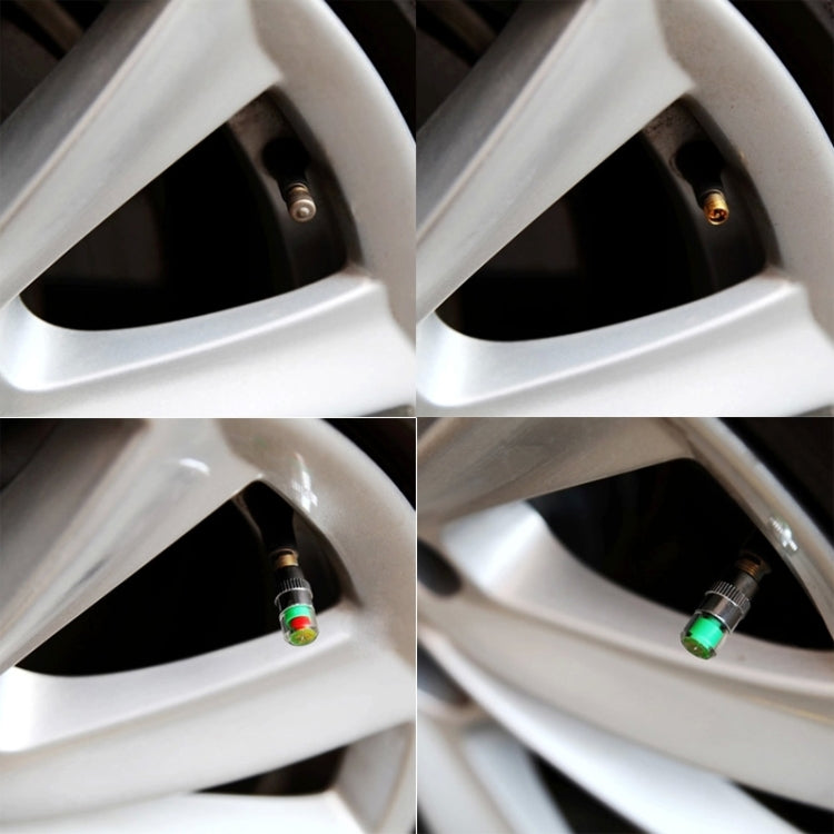 Chrome tire valve caps with green pressure indicators installed on a wheel.