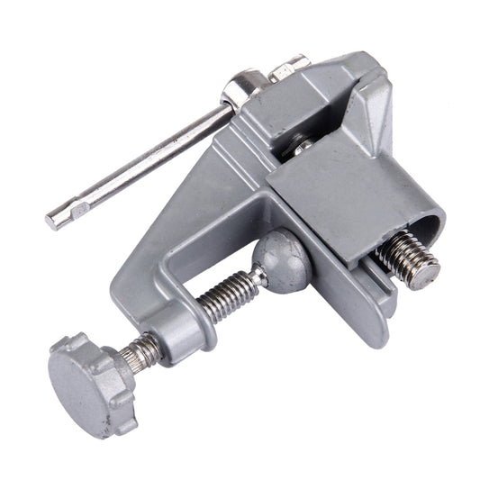 Swivel bench vice with anvil, close side view showing threaded spindle and jaw supports