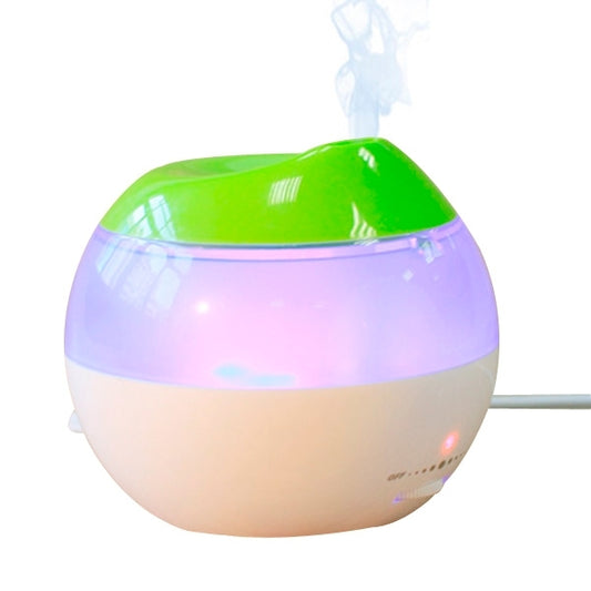 Green-and-white USB air humidifier with glowing top, round body, and visible vapor stream